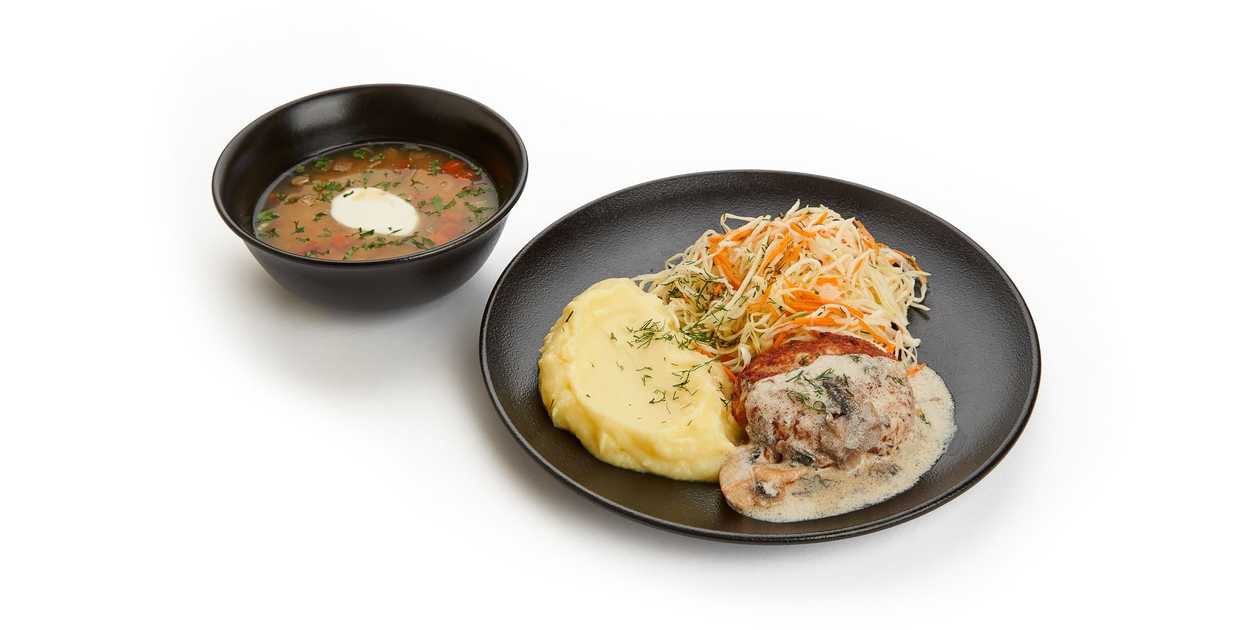 Pea soup and Pork tenderloin with mushroom sauce, mashed potatoes and cabbage salad