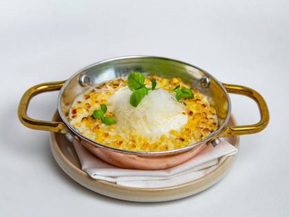 Кукурудза тушкована у вершковому маслі