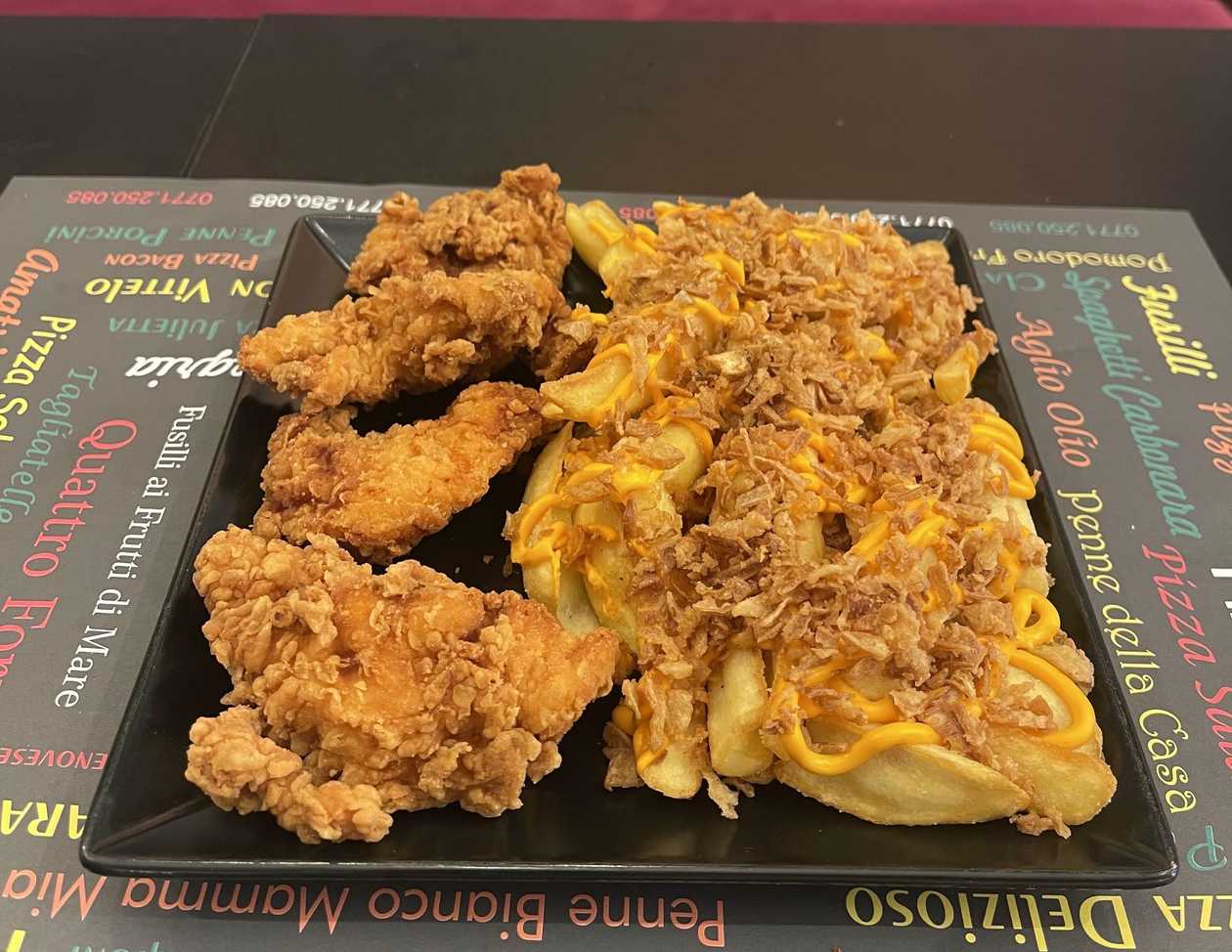 Crispy Spicy Chicken with Potatoes with Cheddar Sauce and Caramelized Onions