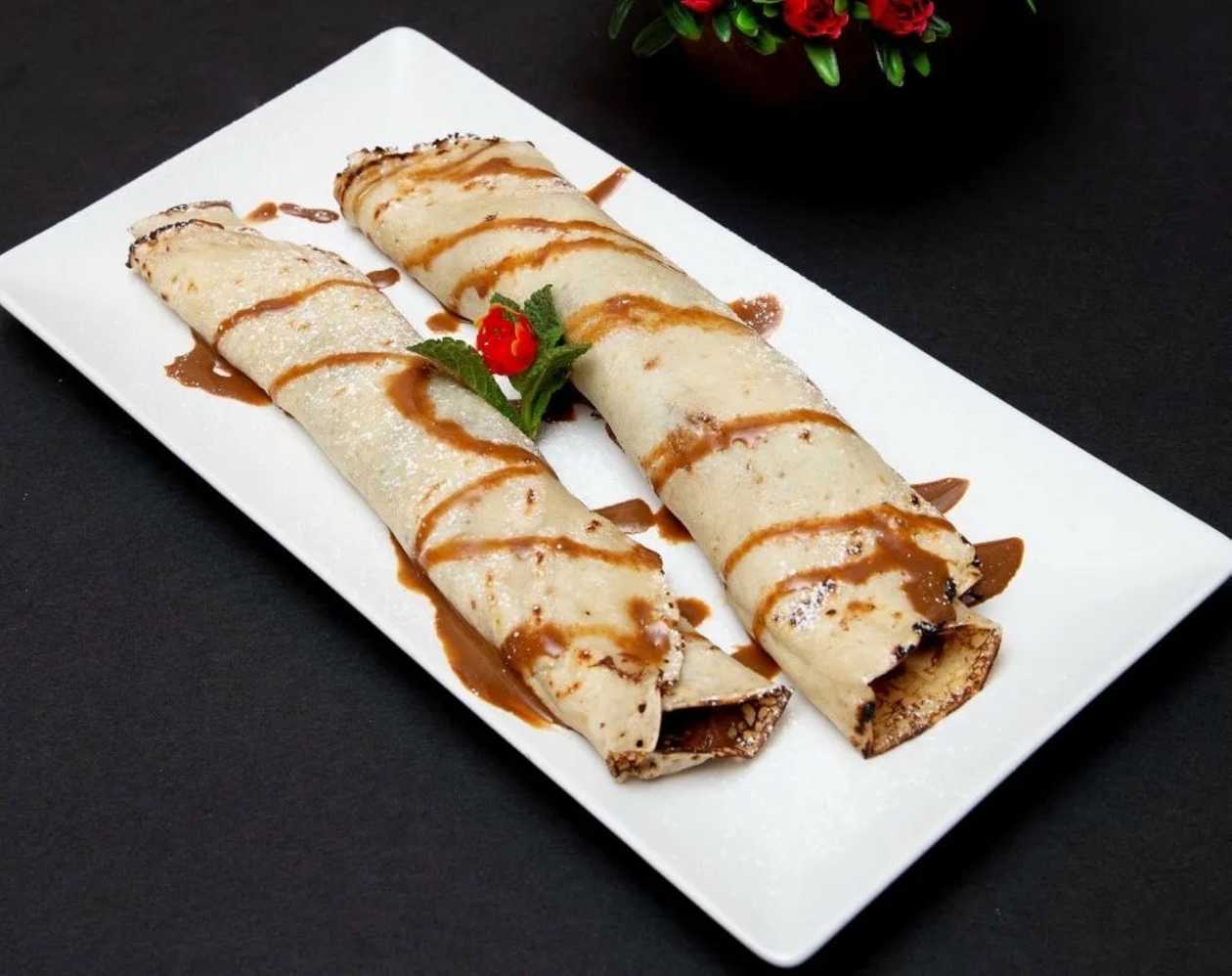 Crepes with Nutella, Bananas, Toasted Peanuts