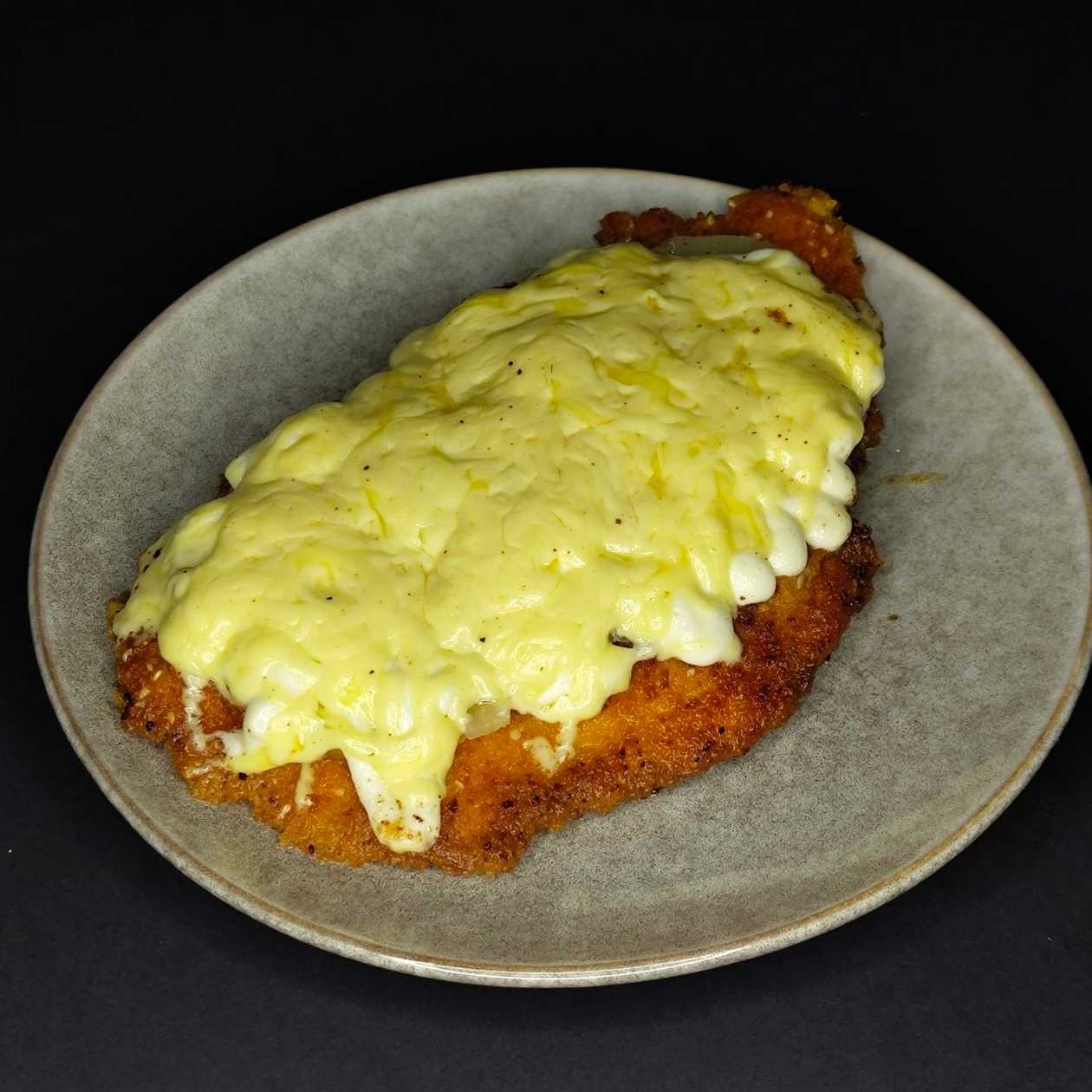 Chicken fillet with cheese and pineapple