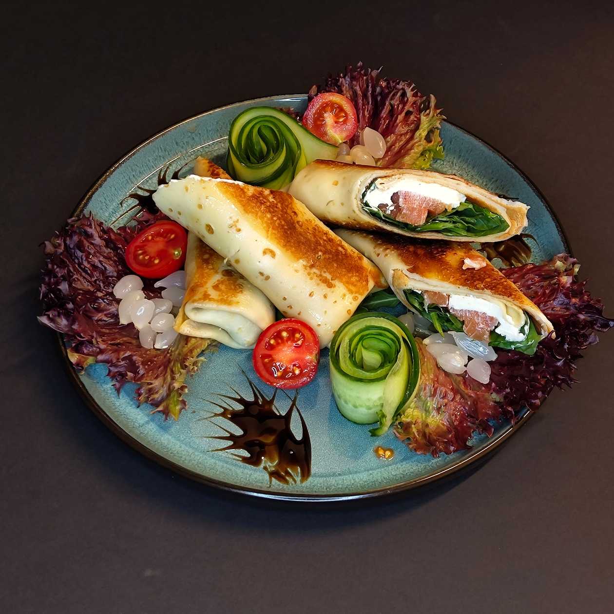 Pancakes with salmon and “Philadelphia” cheese