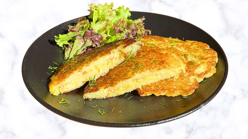 Potato pancakes with chicken breast and cheese