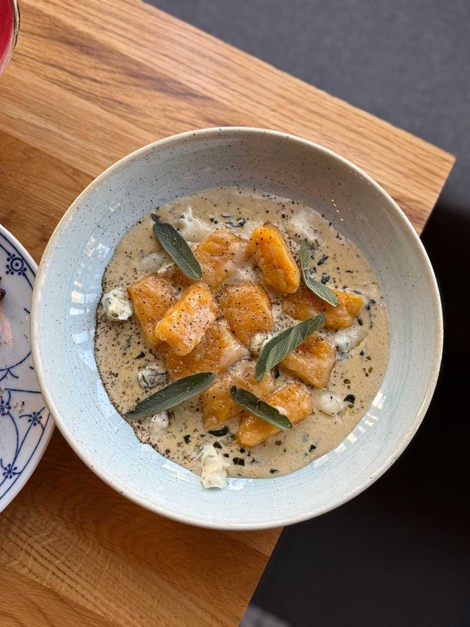 Pumpkin gnocchi in a creamy sage sauce with gorgonzola