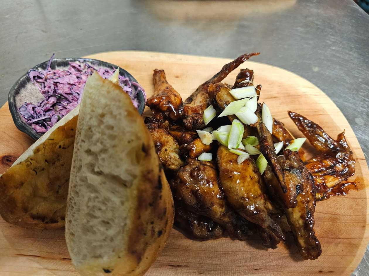 Baked chicken wings in BBQ marinade