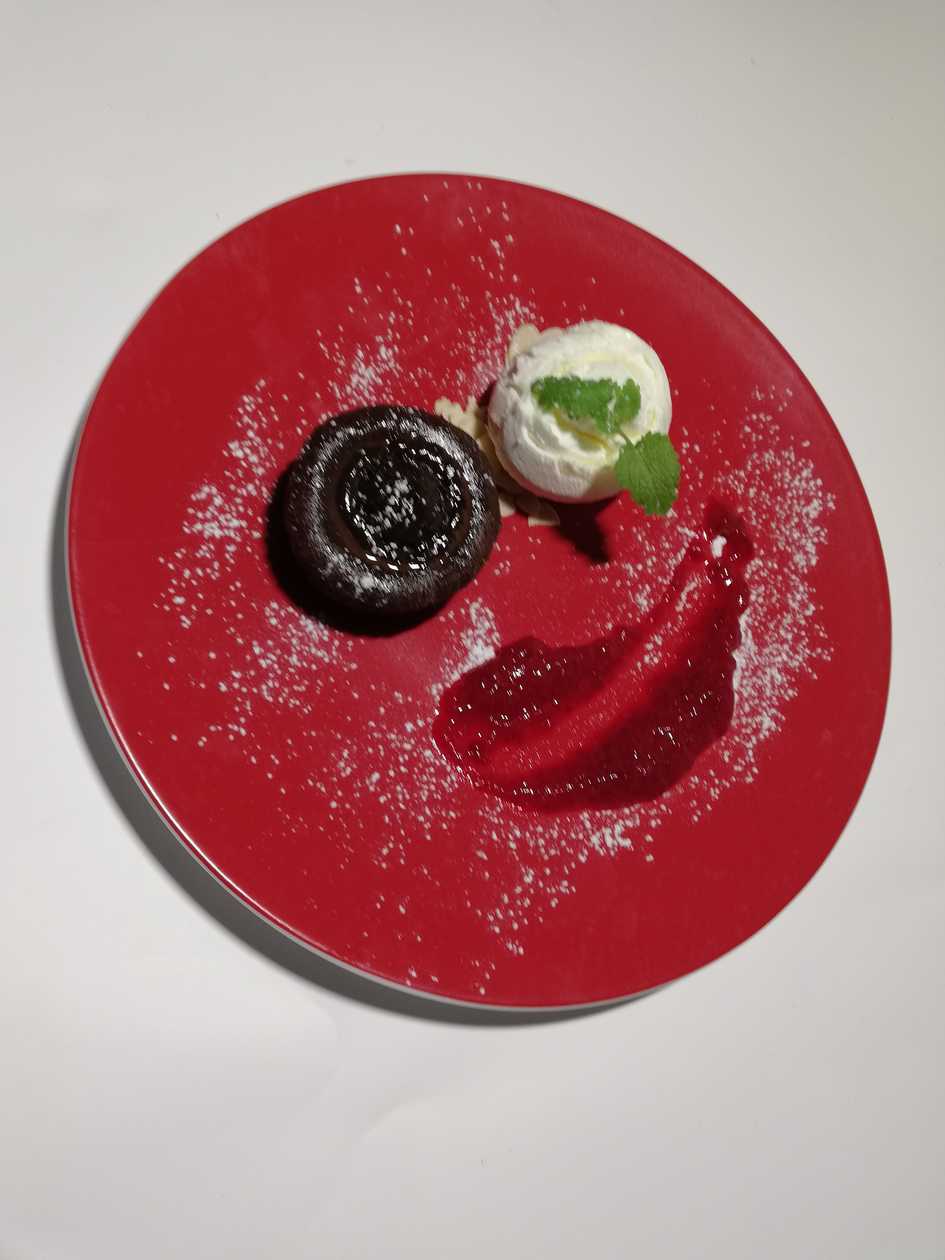 Chocolate lava cake with cranberry jam