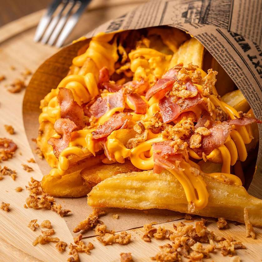 Fries with melted cheddar sauce