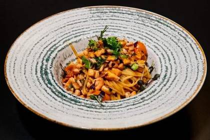 Tagliolini with ragù di salmone and calamari