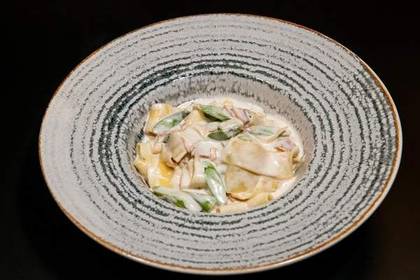 The delicacy of pasta with salmon and asparagus