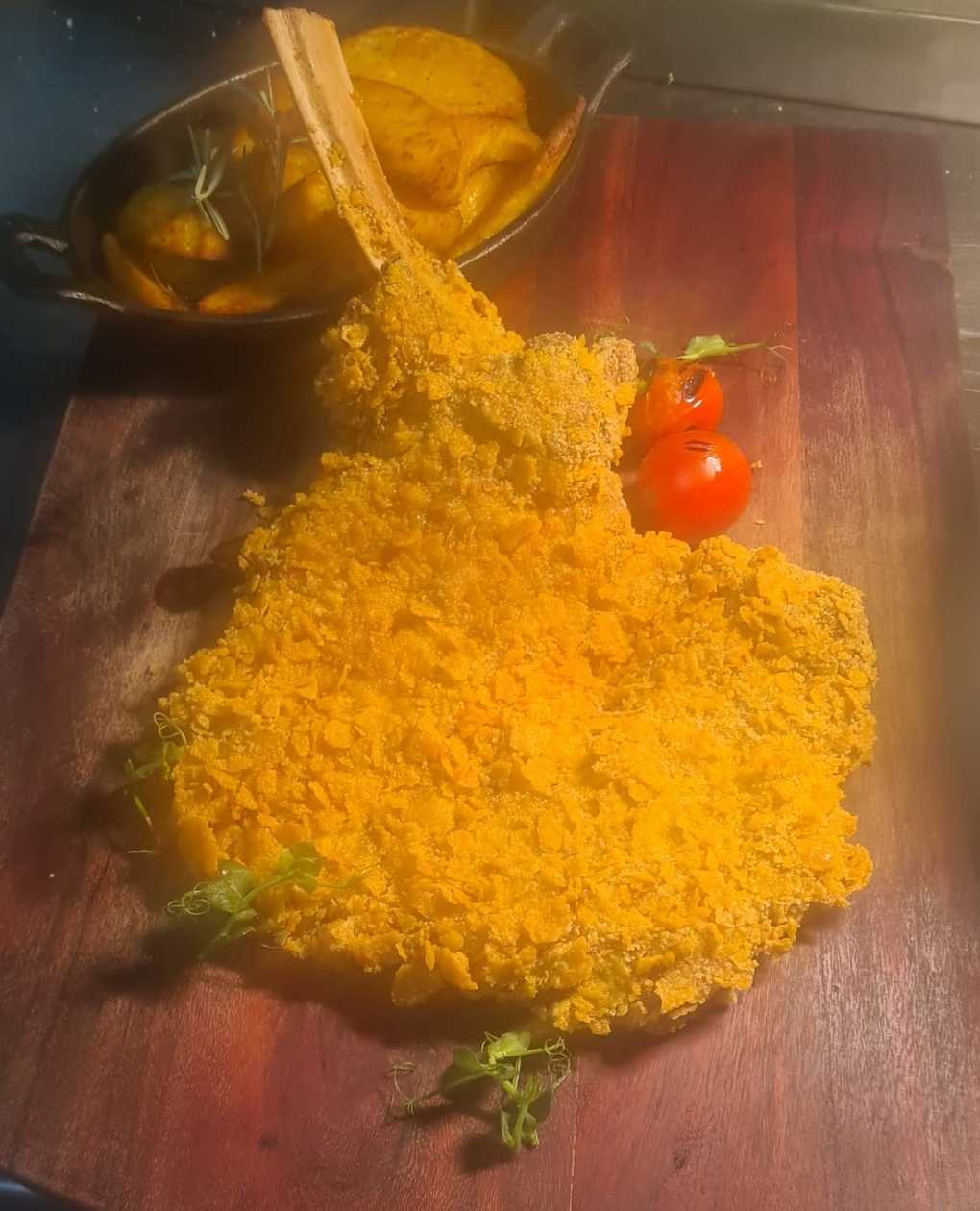 Cotoletta di vitellino con patate al forno
