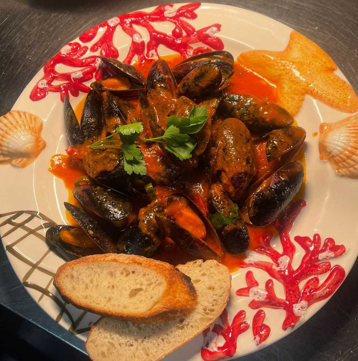Impepata di cozze rosso