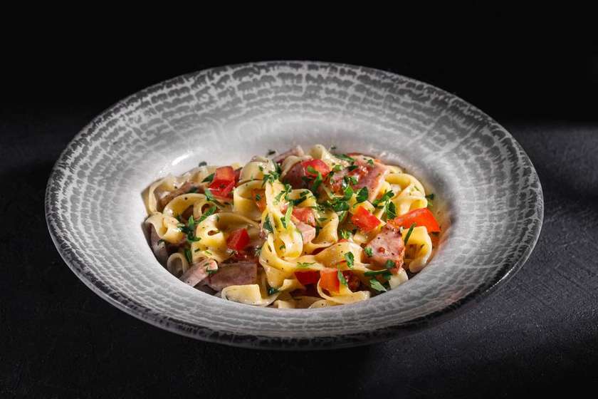 Pasta with mushrooms and ham