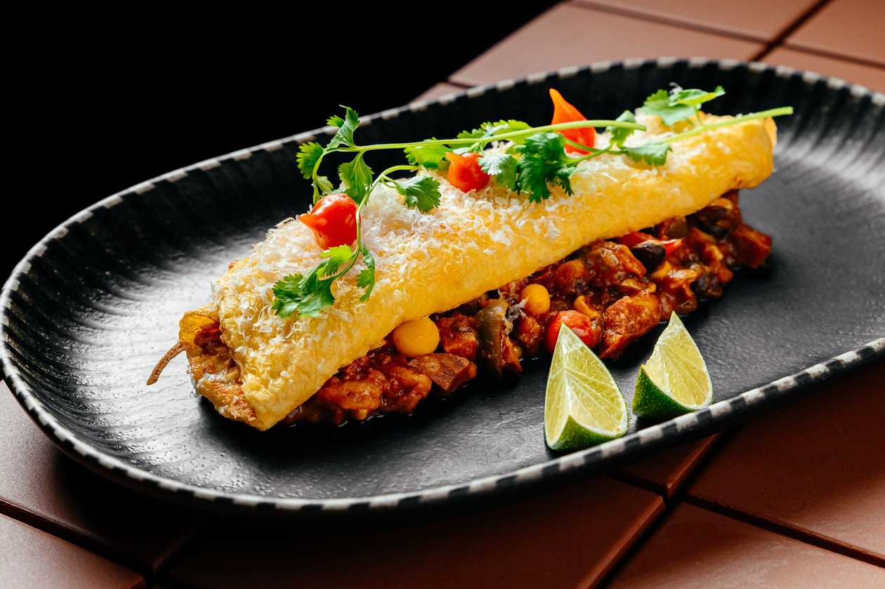 Mexican omelette with chorizo, corn and tomato salsa