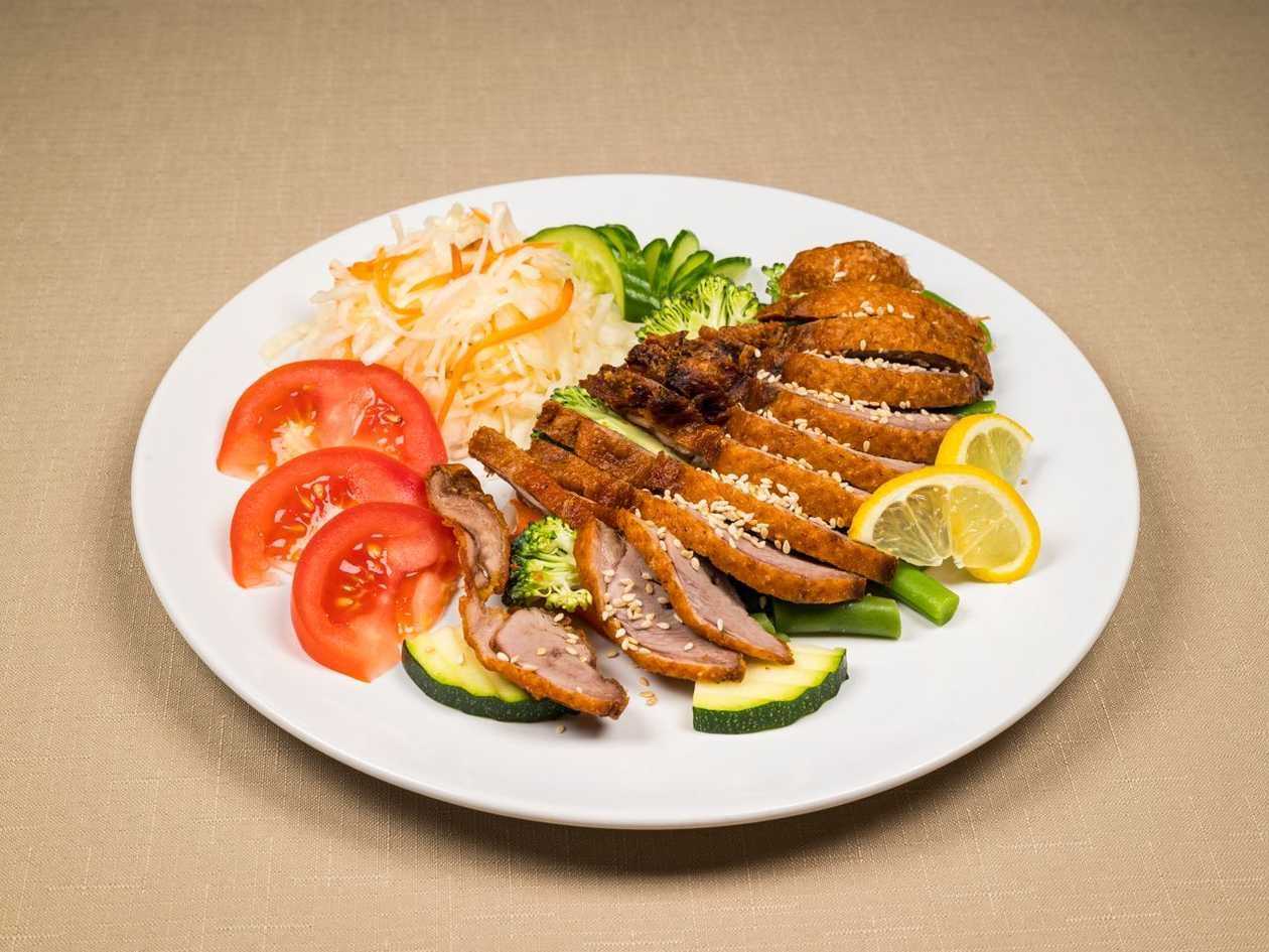 Roasted duck on lemongrass