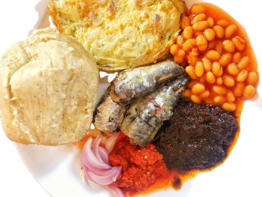 1 ball kenkey+2 fried eggs+1 full tin Sardine