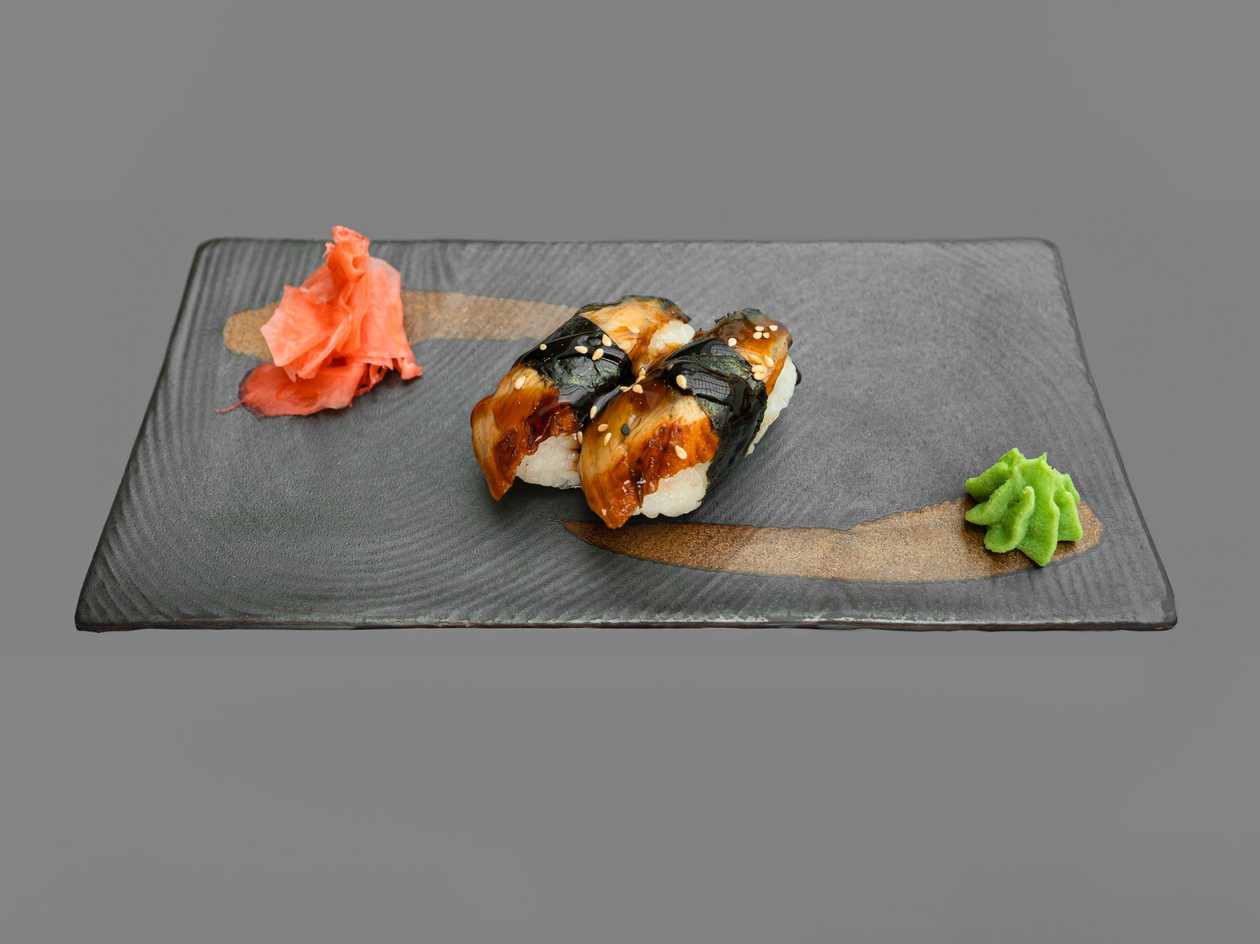 Nigiri eel (2 pcs), eel roll (8 pcs), cucumbers, avocado, sesame