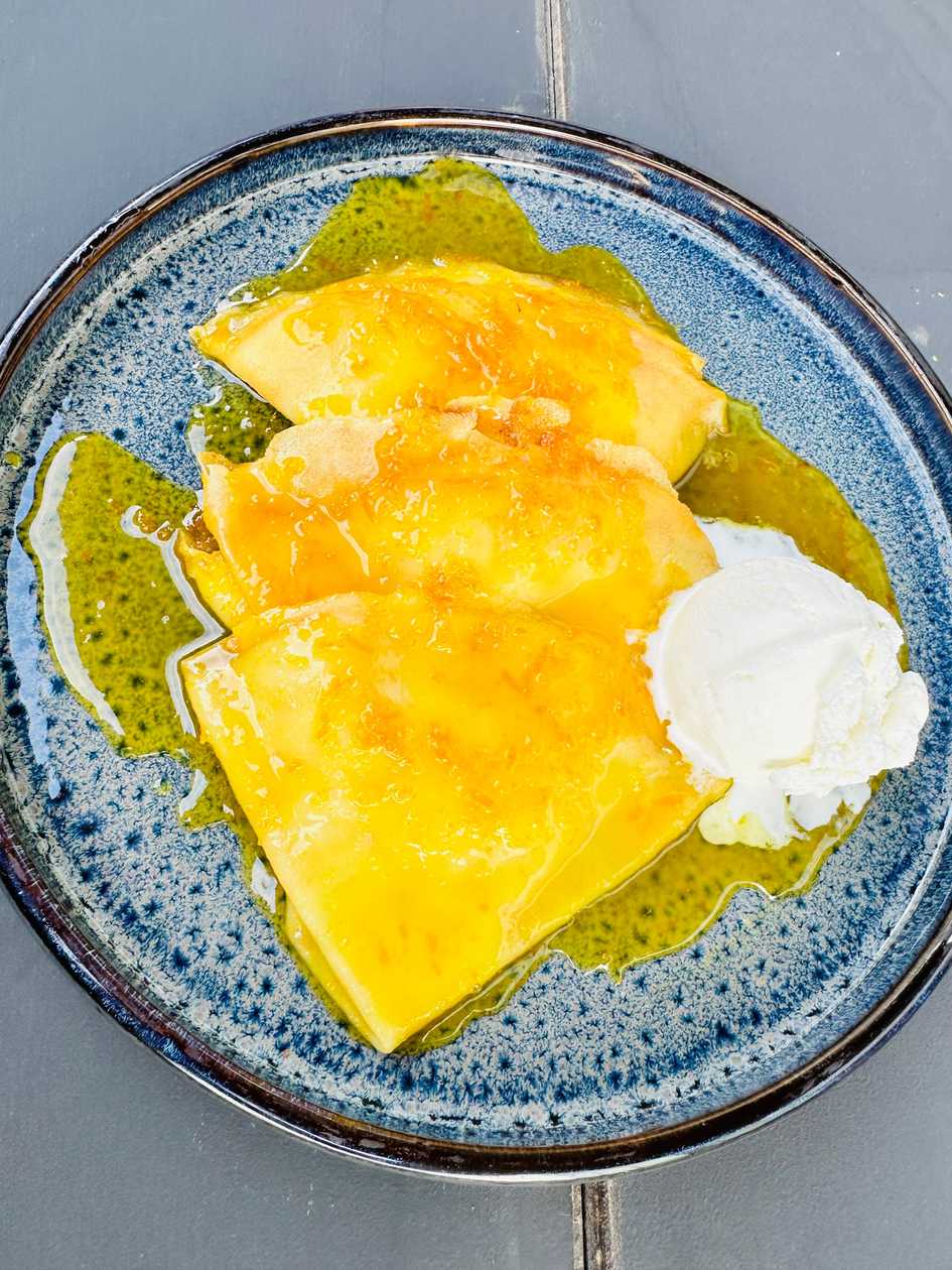 Crepes Suzette with orange sauce