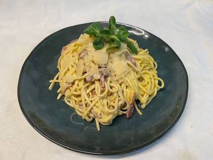Čerstvé Tagliolini Ala Carbonara s restovanou panchettou, vaječnými žloutky a sýrem Grana