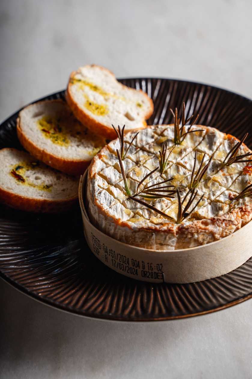 Baked camembert cheese and crostini