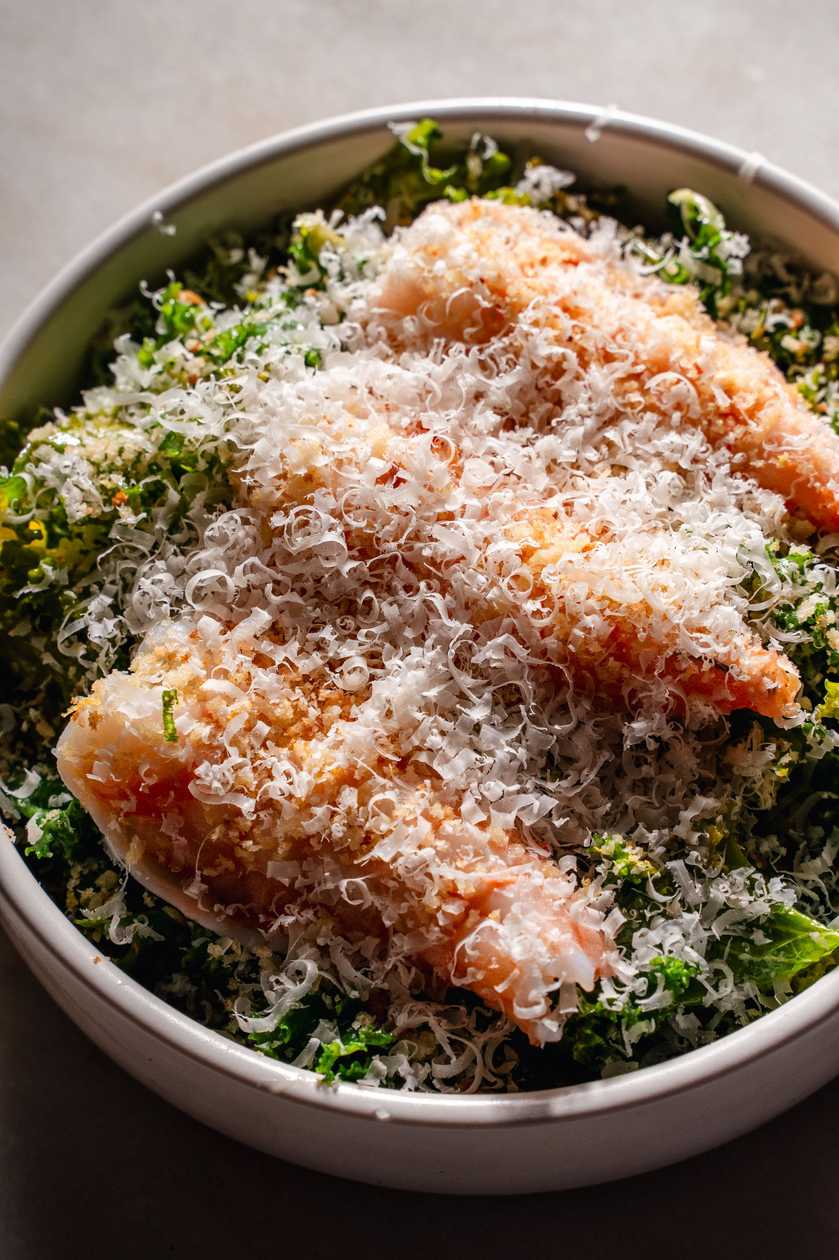 Kale leaf salad with shrimp and caesar dressing