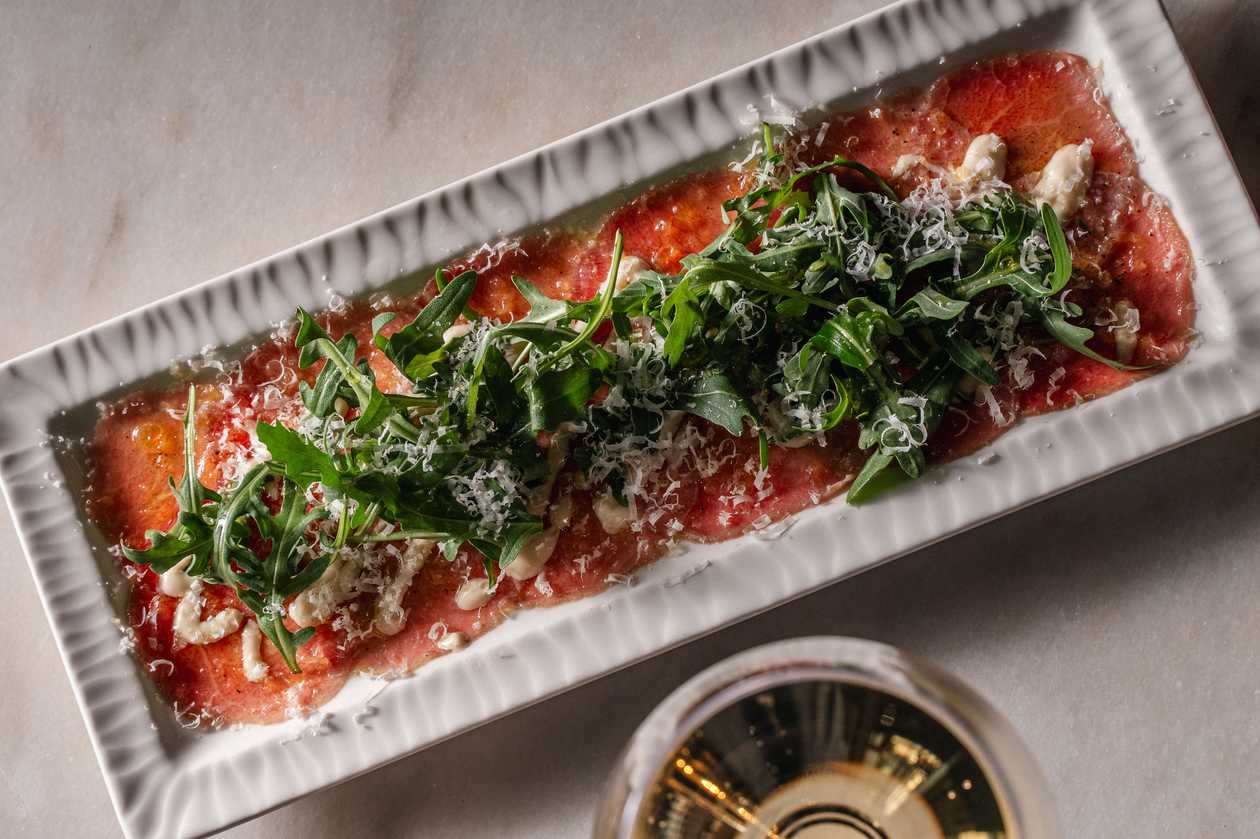 Beef carpaccio, anchovy and pecorino mayo, arugula, parmesan, lemon-olive oil