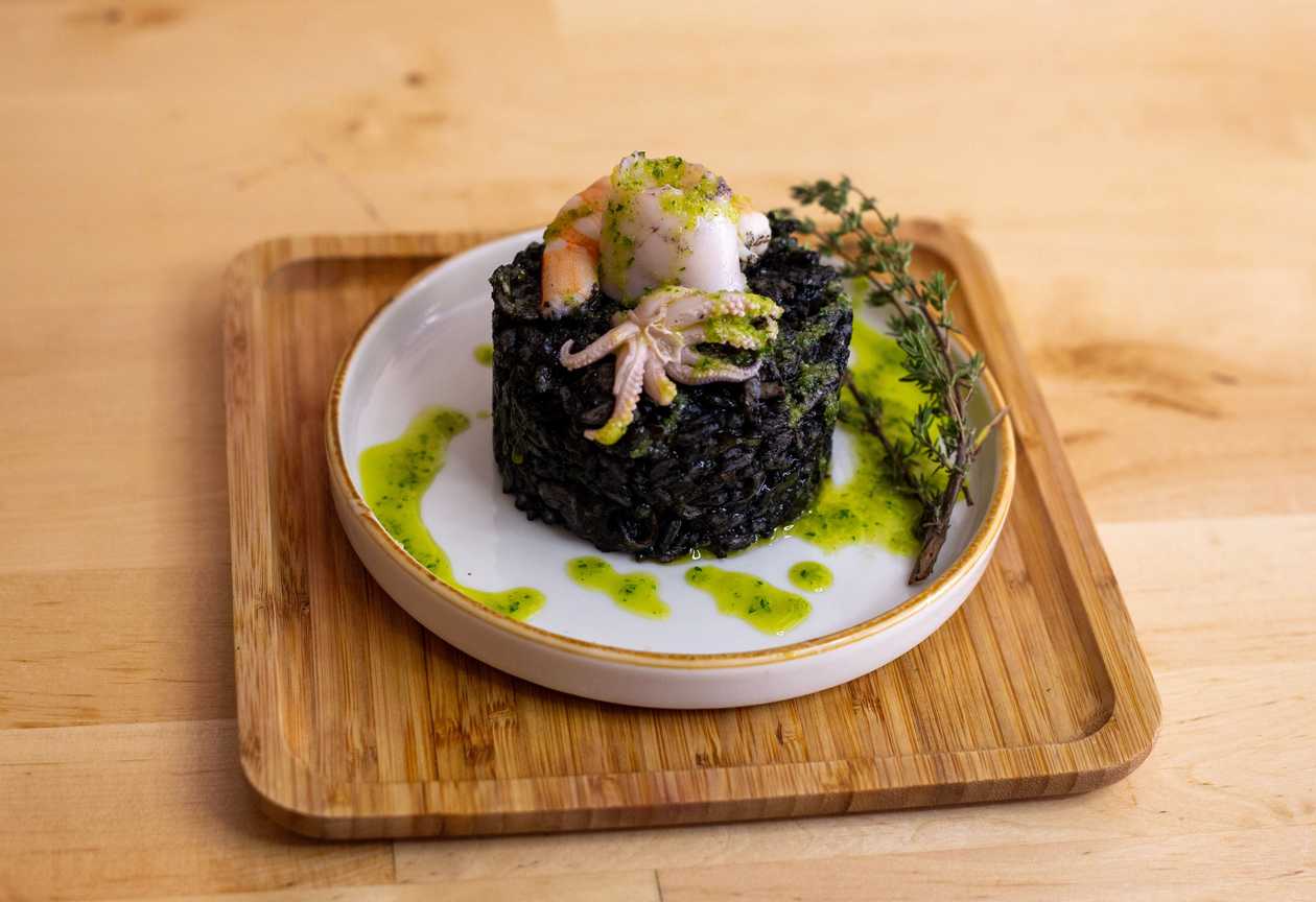 BLACK RICE PAELLA WITH BABY SQUID
