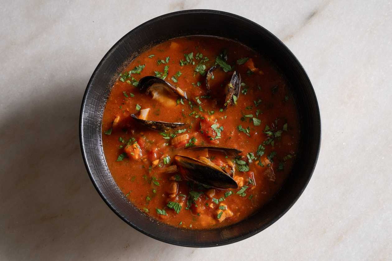 Spicy tomato soup with seafood