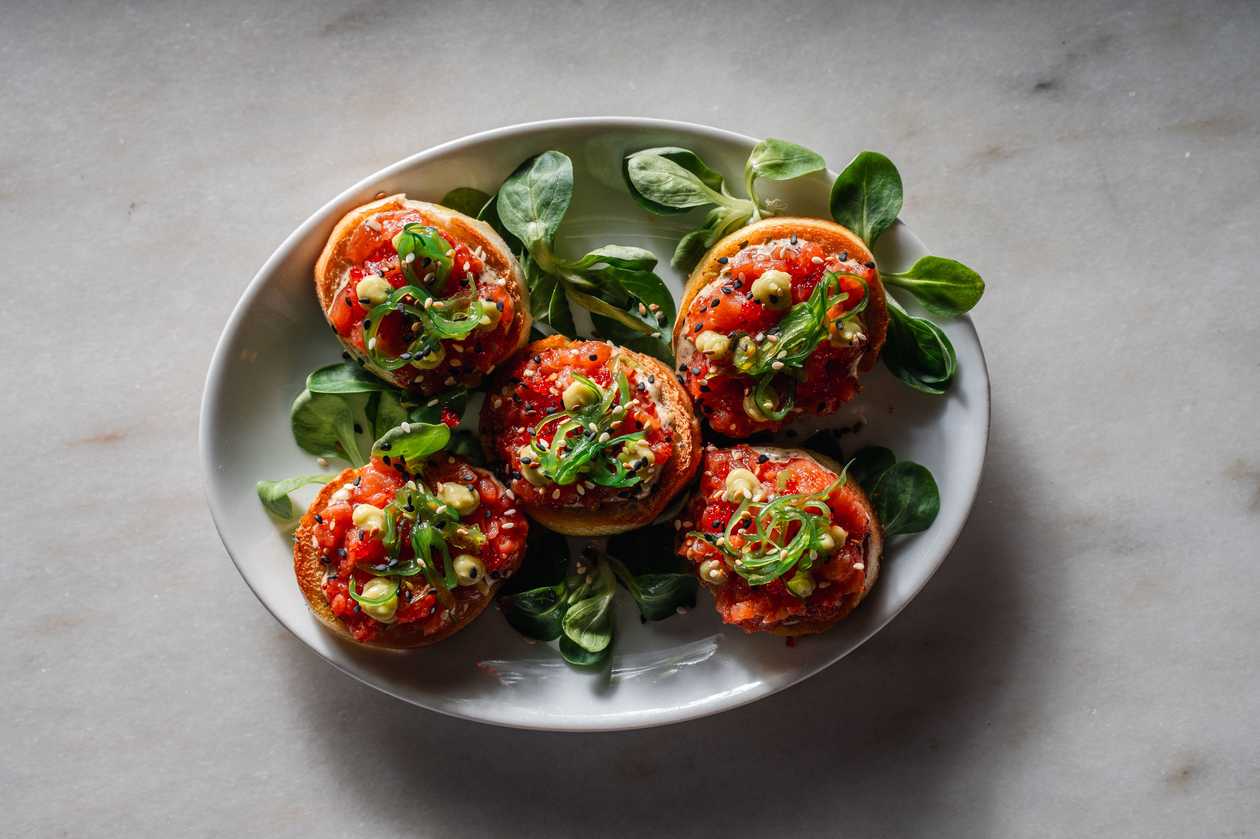 Salmon tartare, wakame, nori mayonnaise, avocado, masago roe, sesame seeds