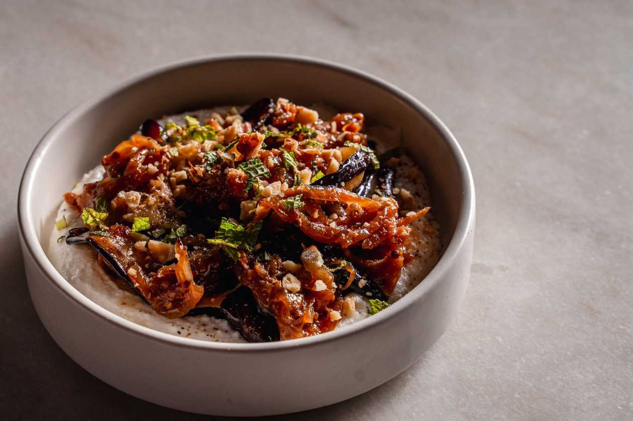 Fried marinated eggplant, ricotta cheese, walnuts, caramelized onions and mustard, truffle honey
