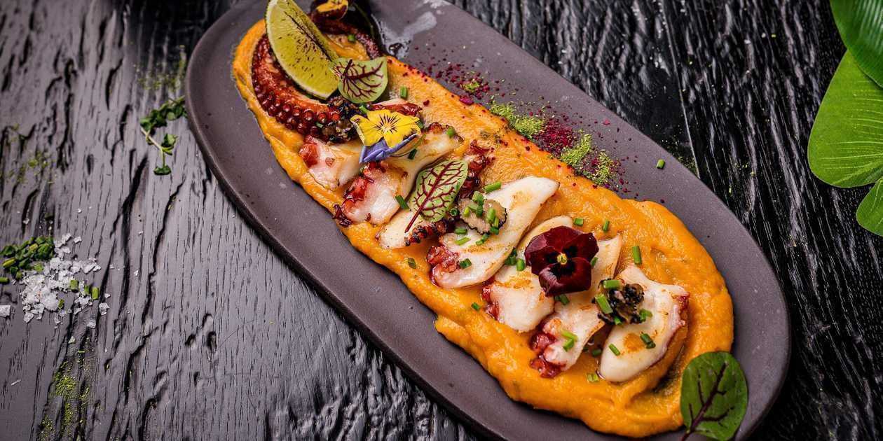 Octopus tentacles with truffled sweet potato puree