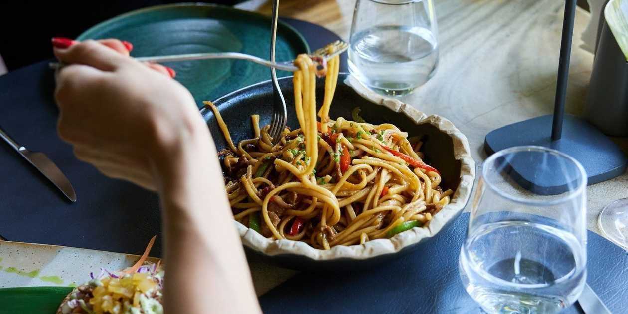 Noodles with beef tenderloin strips