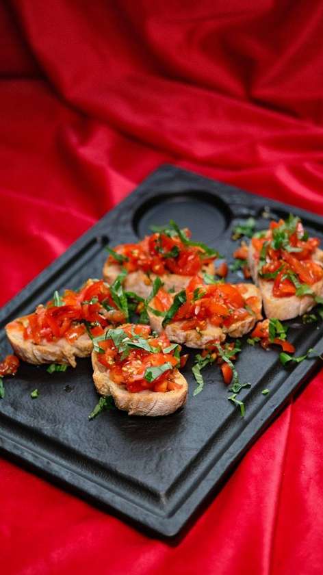 Bruschetes with Tomatoes and Basil