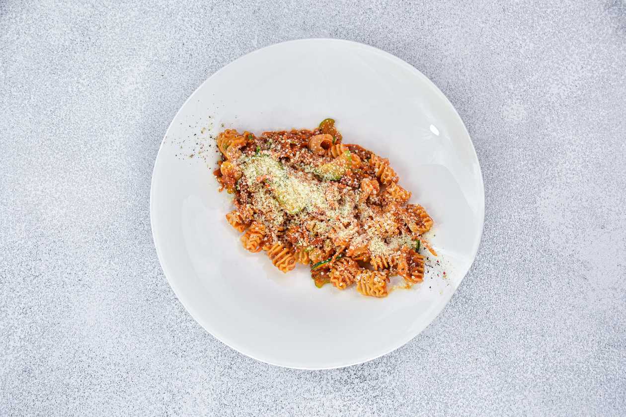 With bolognese sauce