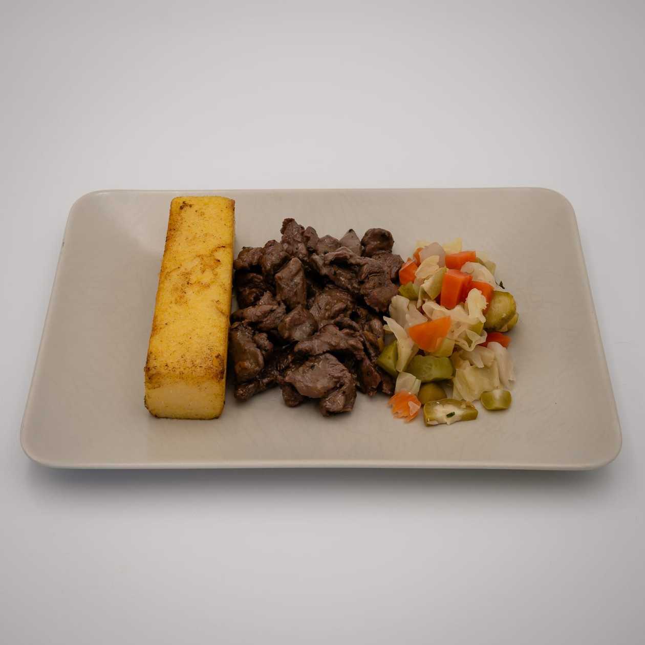 Tender slices of pan-fried pastrami