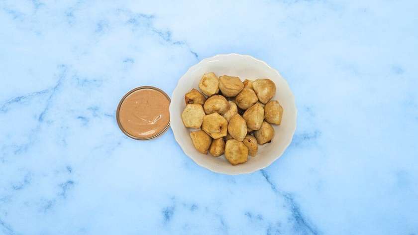 Baked Dumplings With Garlic Sauce