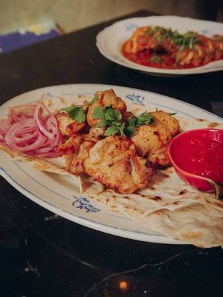 Char grilled chicken thigh