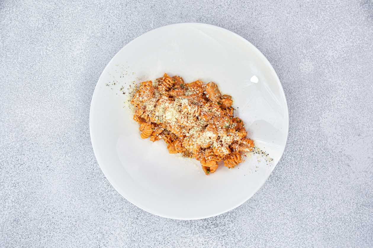 With chicken, brown champignons and pink cream sauce