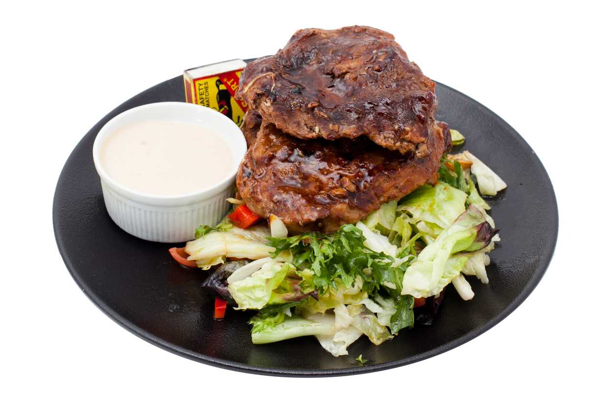 Pork roast in teriyaki sauce with salad mix