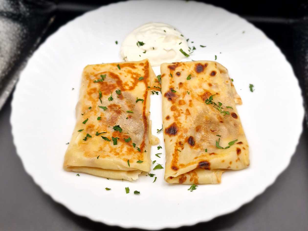 Pancakes with cheese and herbs, 2 pieces.