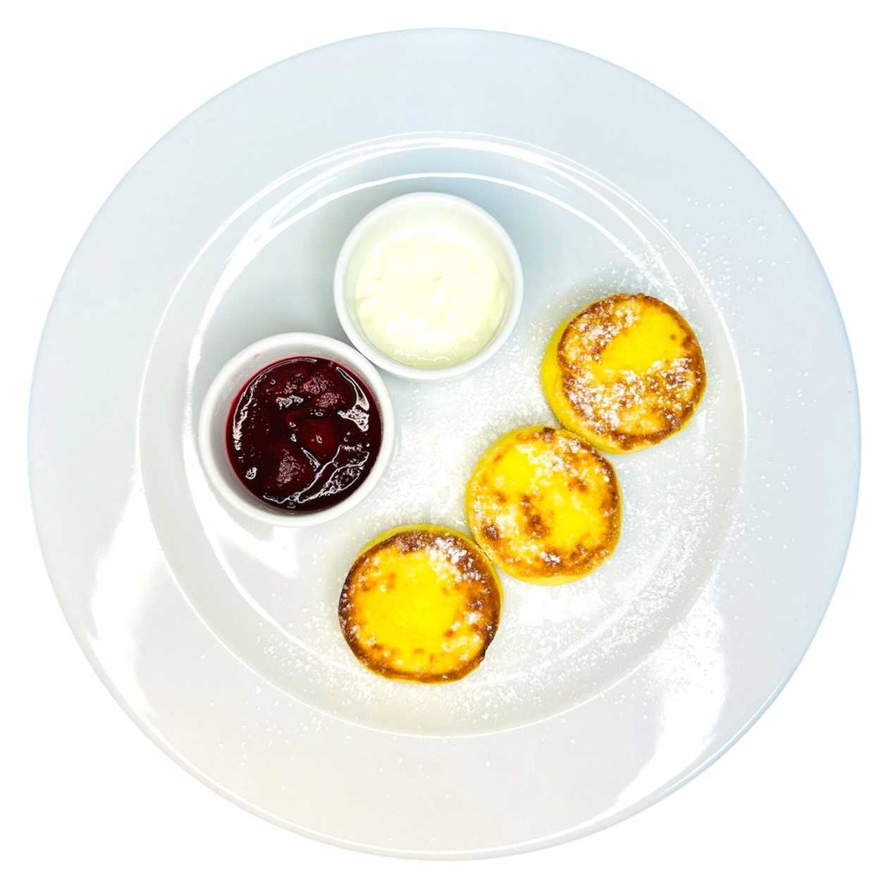 Syrniki with Berry Jam and Sour Cream