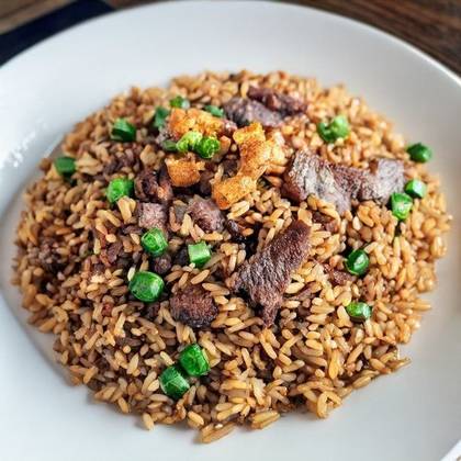 Jollof or Fried Rice with Goat or Fish