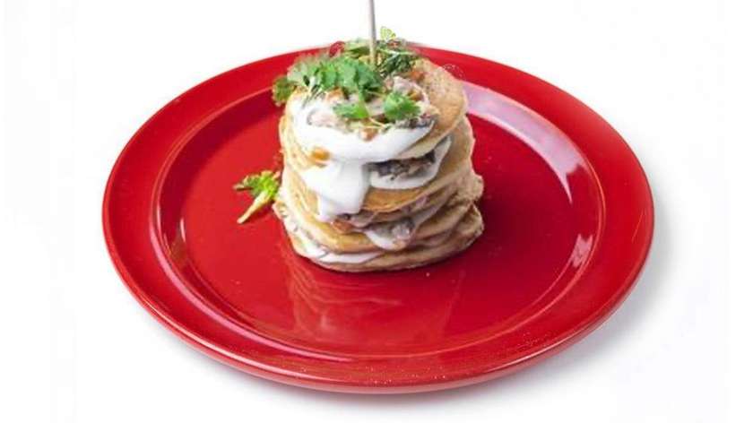 American pancakes with chicken, carrots and mushrooms