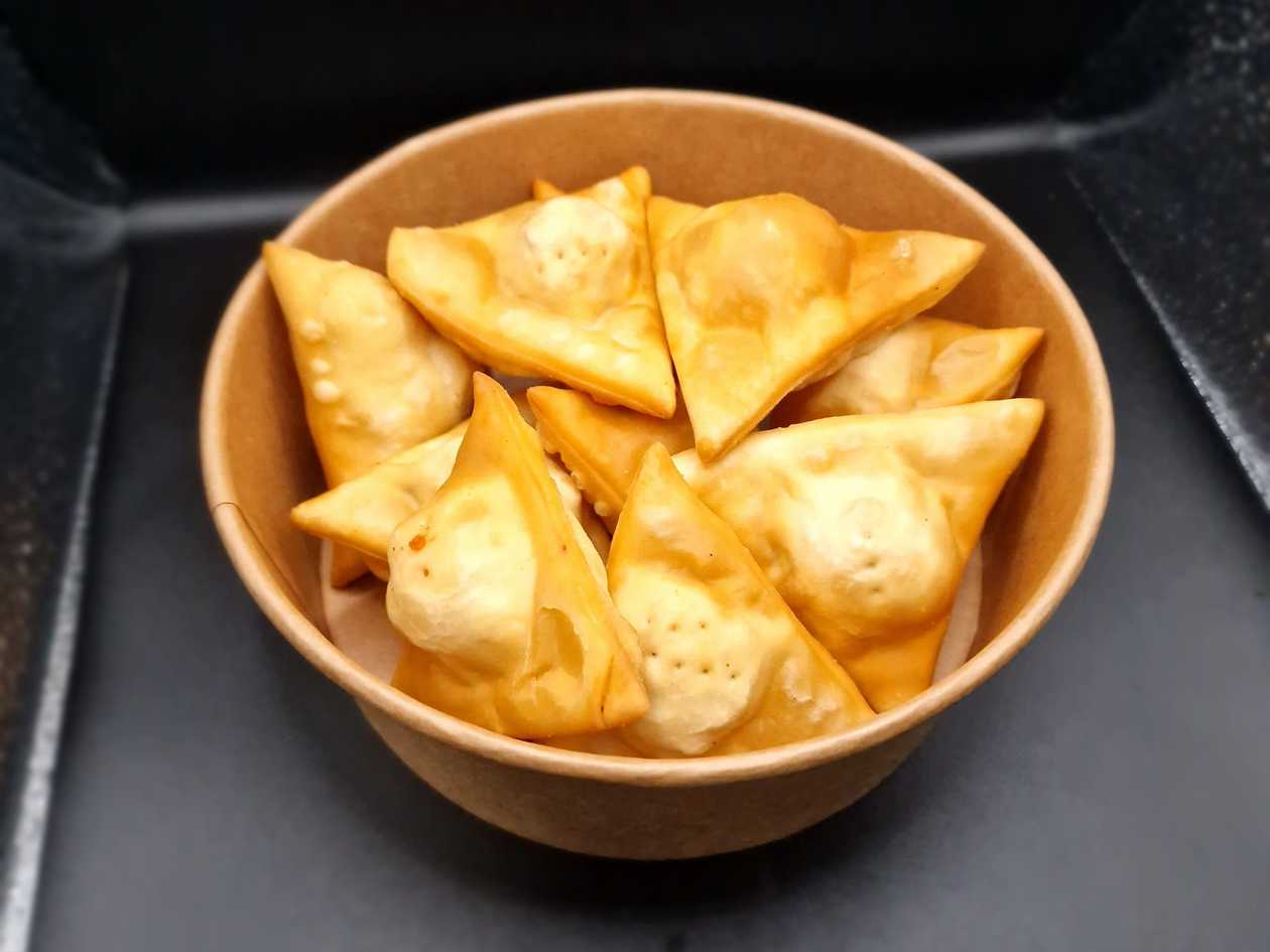 Fried dumplings with cheese and ham