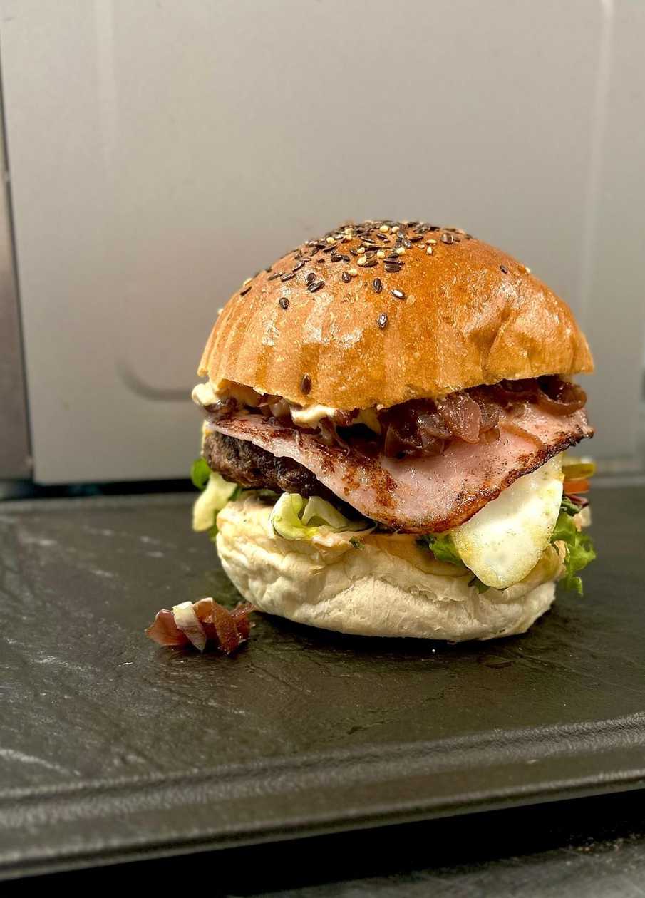 Mini homemade burger with fries and BBQ sauce