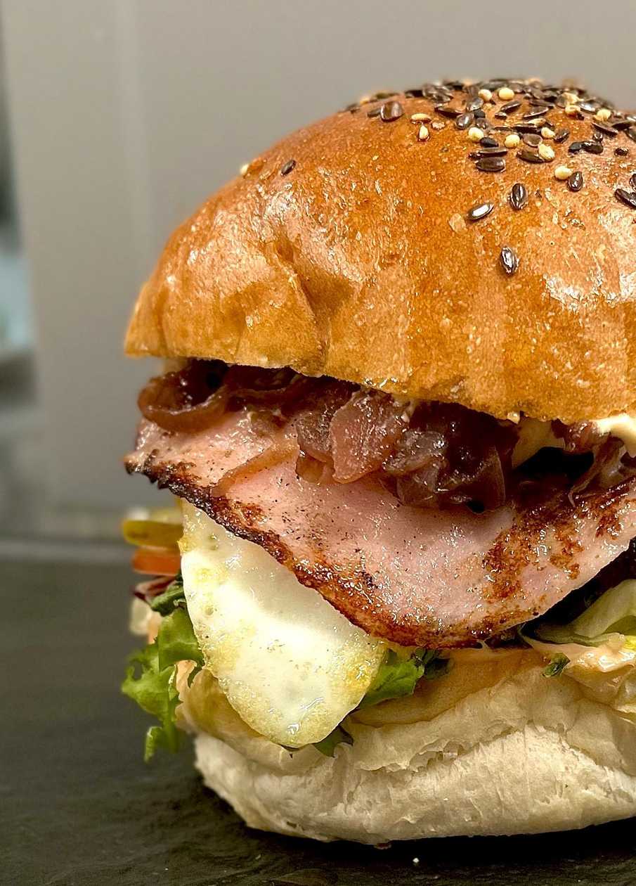 Homemade burger with fries and BBQ sauce