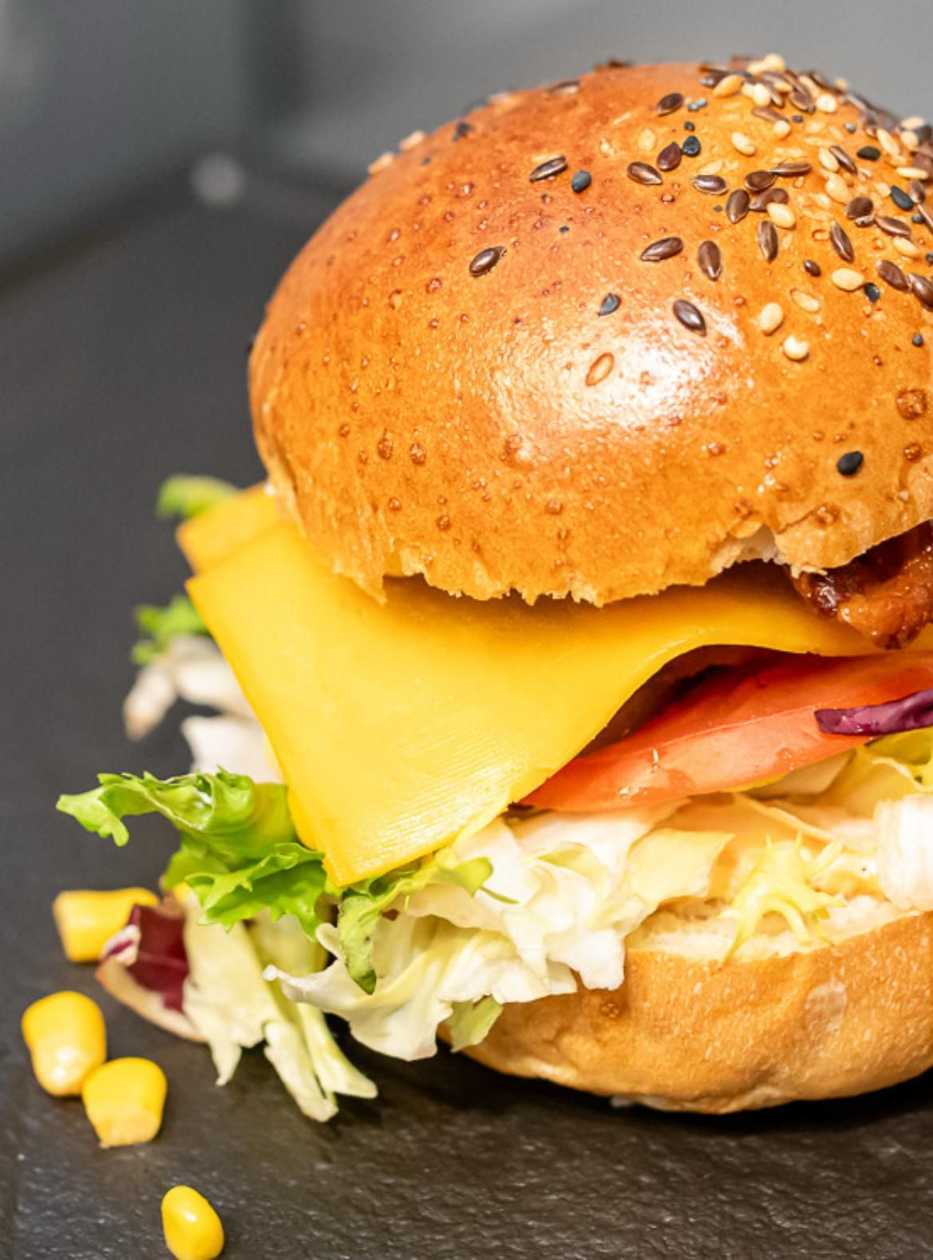 Mexican burger with chips and BBQ sauce
