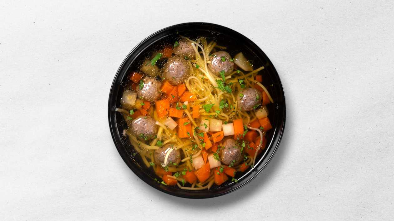 Meat broth with noodles and vegetables