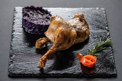 Duck Thighs Cooked for a Long Time, Served with Red Cabbage and Baked Apples