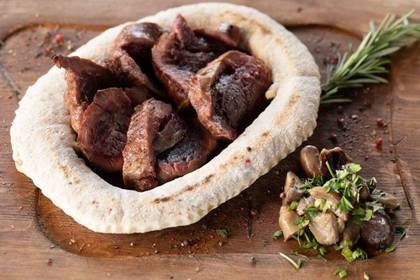 Tagliata with Beef, Boletus and Focaccia Ring