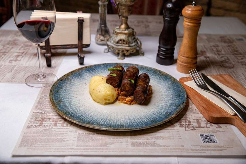 Game Sausages with "Mangalita" Pork and Forest Hazelnuts, Fried in a Wood Charcoal